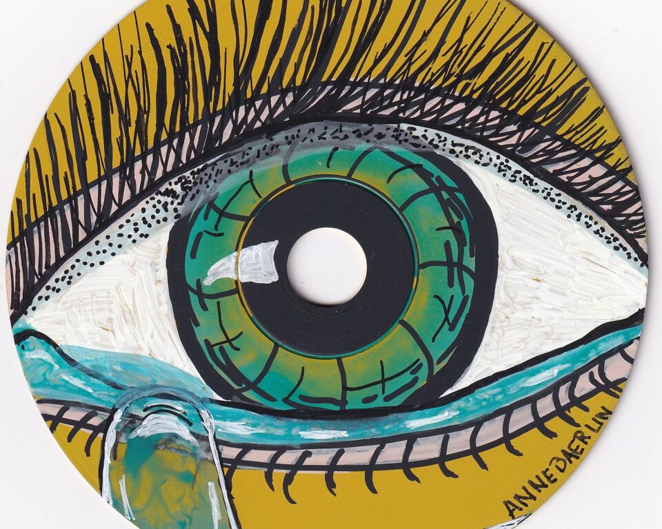 CD Rom 1 blaues Auge Tränen gelber Hintergrund