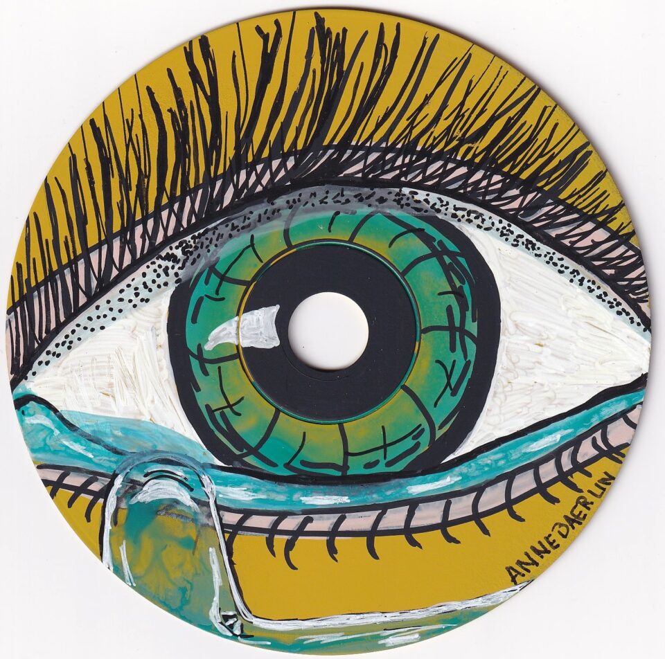 CD Rom 1 blaues Auge Tränen gelber Hintergrund